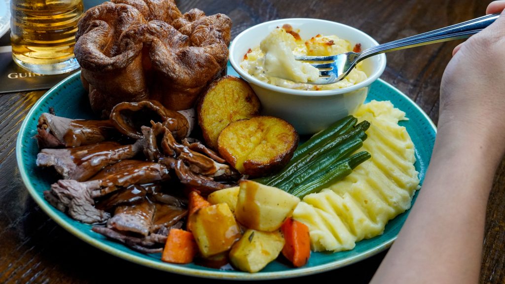 Adams Beer Kitchen Sunday Roast experience in Abu Dhabi with traditional carvery and drinks