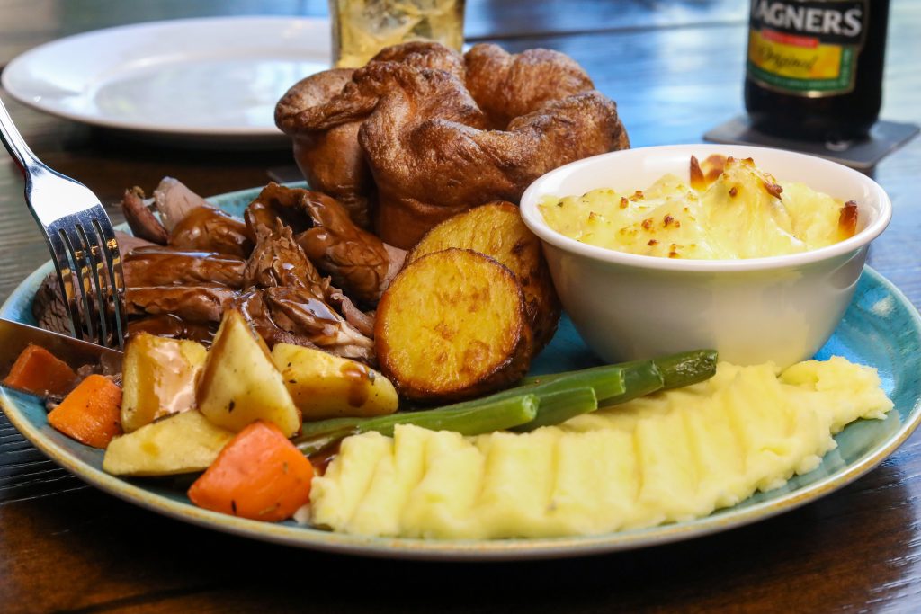 Adams Beer Kitchen Sunday Roast experience in Abu Dhabi with traditional carvery and drinks